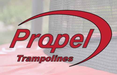 The Propel Trampolines logo superimposed over a blurry picture of a spring pad protector