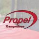 The Propel Trampolines logo superimposed over a blurry picture of a spring pad protector