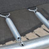 coil springs attached to trampoline mat and frame