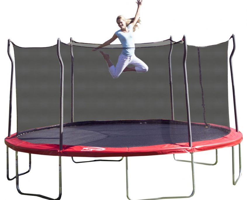 A blond mom in white pants jumps on a red Propel trampoline