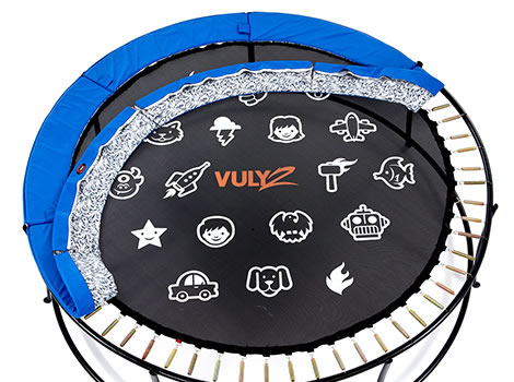 A HexVex trampoline mat with blue pad lifted to reveal springs